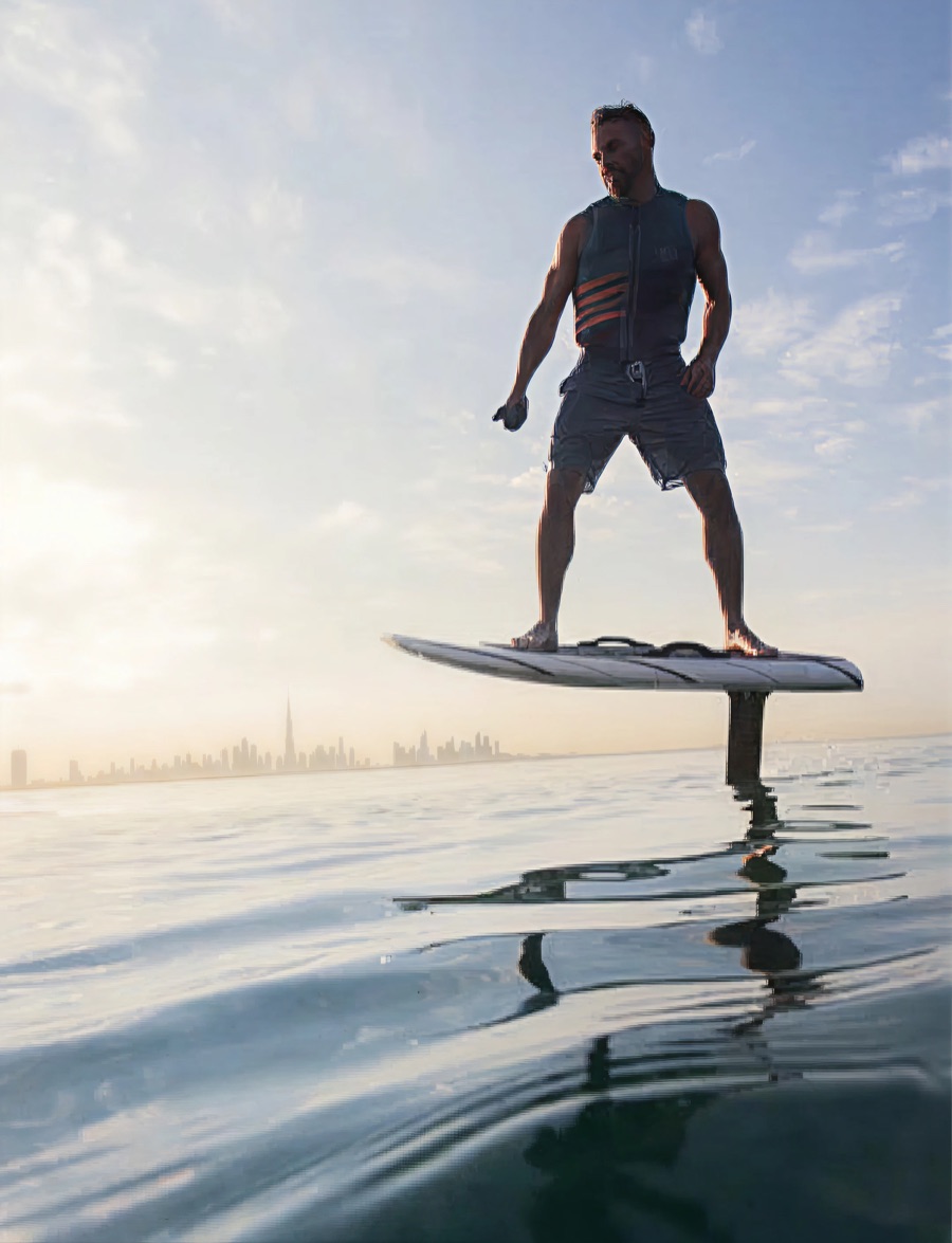 Hydrofoil rider gliding above the swell