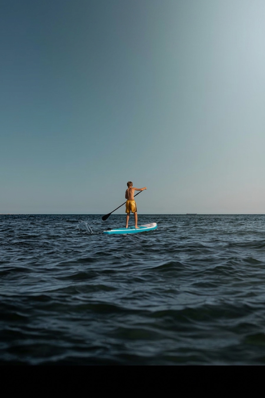 Stand-up paddle at dawn near the Palm Jumeirah